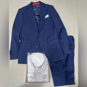 Boys 3 piece suit in size 7 comes with white button shirt. NWOT